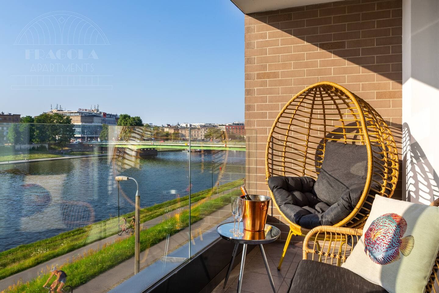 Step onto the balcony to savor the fresh air and take in breathtaking views of the Vistula River. This spot offers an ideal setting for relaxation. The balcony enhances your stay with an extra touch of charm.